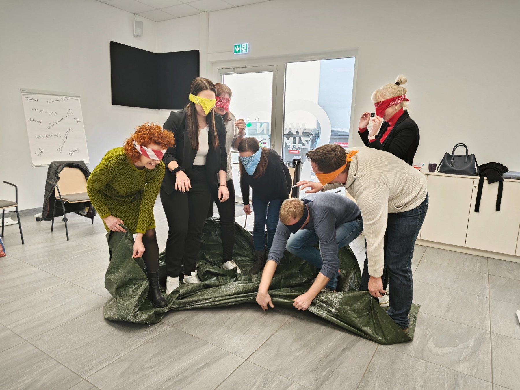 A group in an experiential team exercise